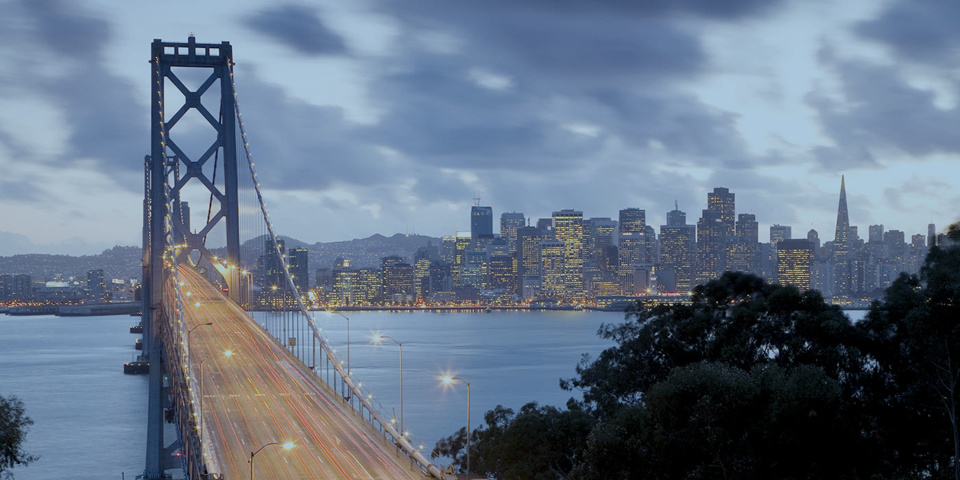 Bay Bridge And San Francisco Skyline With Blue Tone